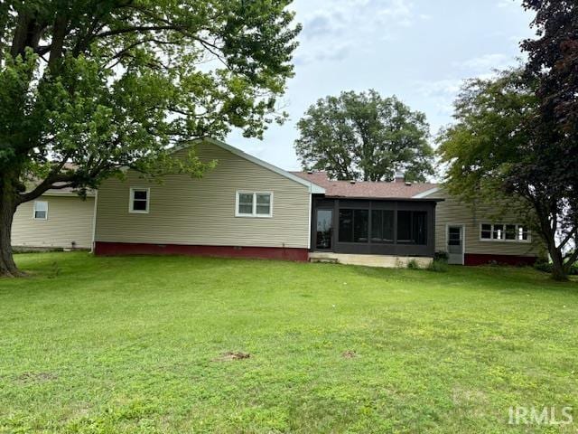 7737 N 100 E Rd, Lucerne, IN 46950 - rear view of property featuring a lawn