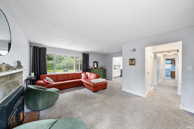 241 Sylvan Glen Dr, South Bend, IN 46615 - carpeted living area featuring baseboards and a fireplace