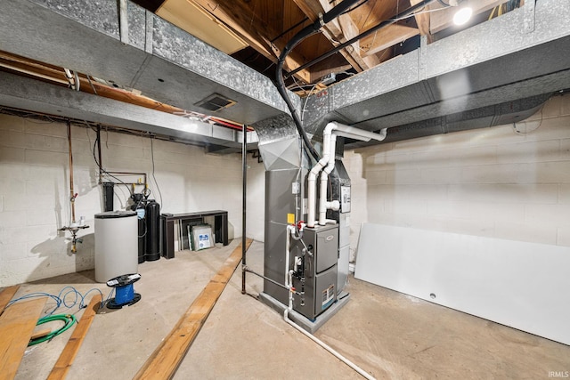 241 Sylvan Glen Dr, South Bend, IN 46615 - unfinished below grade area with heating unit and a water softener system