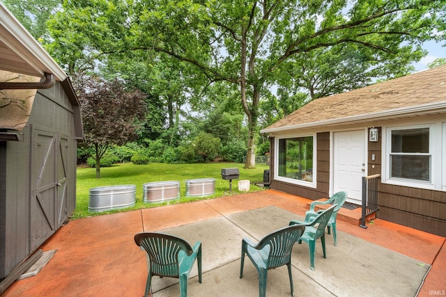 241 Sylvan Glen Dr, South Bend, IN 46615 - view of patio featuring a storage unit