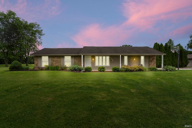 17135 Old 24 Rd, Woodburn, IN 46797 - single story home with a yard and brick siding