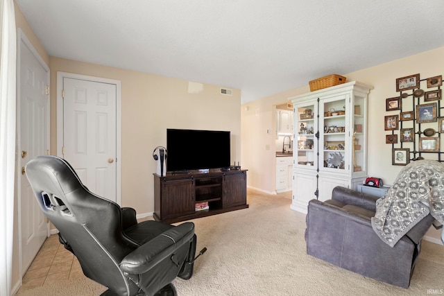 17135 Old 24 Rd, Woodburn, IN 46797 - living area featuring baseboards and light carpet