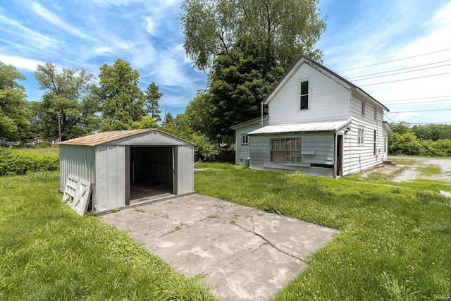 4508 Wells St, Delphi, IN 46923 - view of green lawn with a storage shed