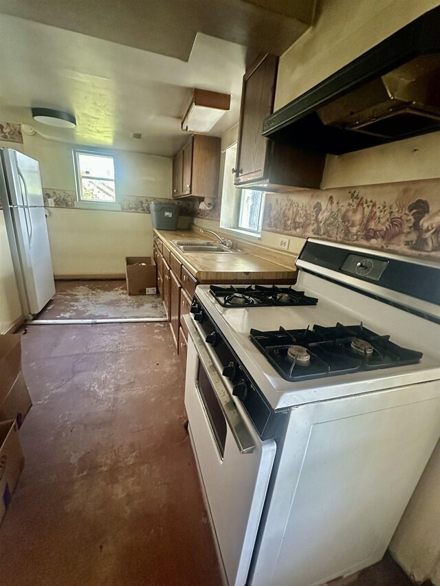 1995 S 445 E, Royer Lake, Lagrange, IN 46761 - kitchen with white appliances, extractor fan, and concrete flooring