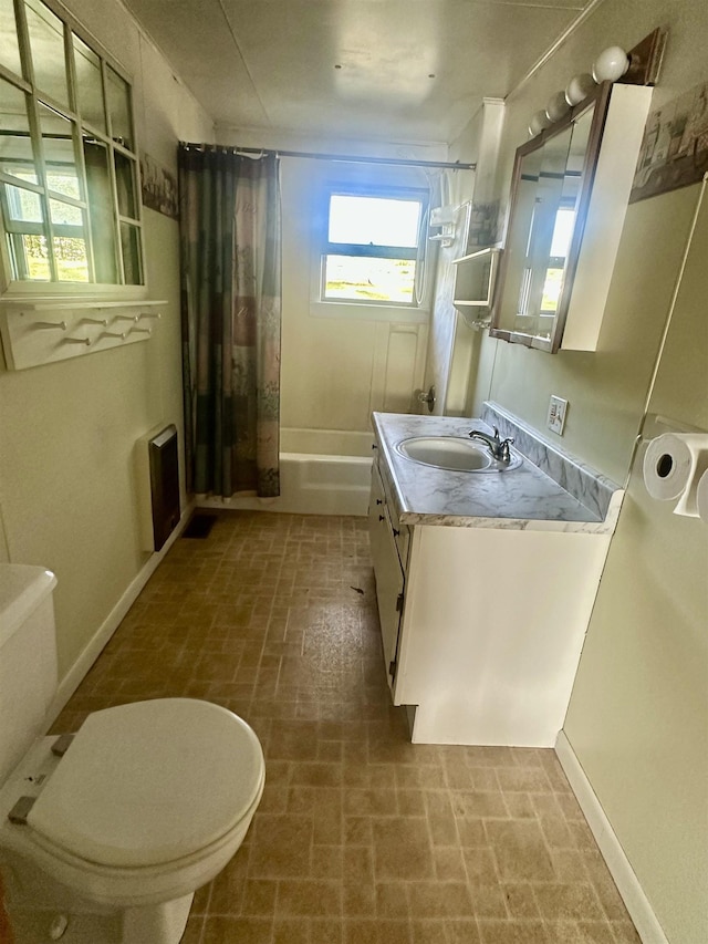 1995 S 445 E, Royer Lake, Lagrange, IN 46761 - bathroom featuring brick patterned floors, vanity, and shower / bath combination with curtain
