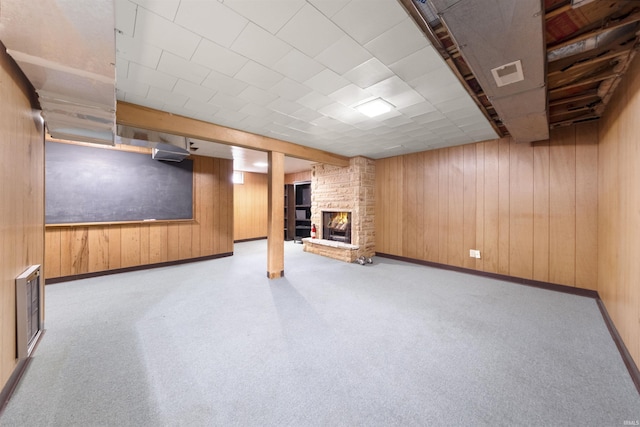 1545 Werling Rd, New Haven, IN 46774 - finished below grade area with wood walls, a fireplace, and carpet floors