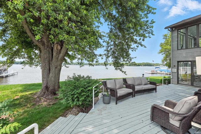 18 Ems T13E Ln, Leesburg, IN 46538 - wooden deck featuring a water view and an outdoor living space