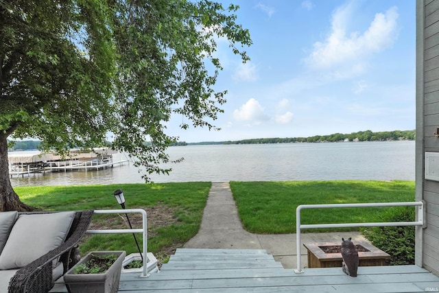 18 Ems T13E Ln, Leesburg, IN 46538 - dock featuring a water view and a lawn
