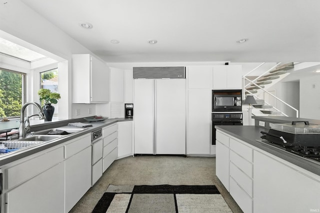 18 Ems T13E Ln, Leesburg, IN 46538 - kitchen featuring black appliances, white cabinetry, and recessed lighting