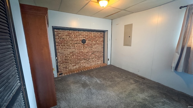 3557 N 150 E, Camden, IN 46917 - empty room with electric panel, carpet flooring, and brick wall