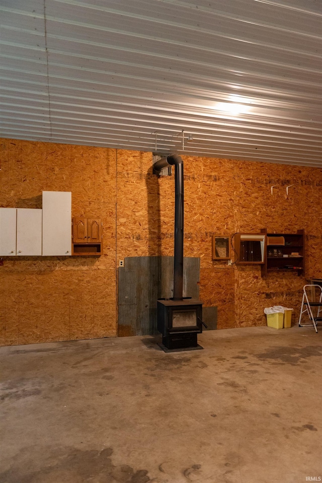 3557 N 150 E, Camden, IN 46917 - garage featuring a wood stove