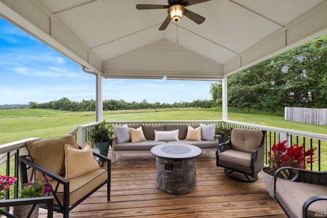 4685 N Triple Crown Dr, Bloomington, IN 47404 - deck featuring ceiling fan, outdoor lounge area, and a lawn