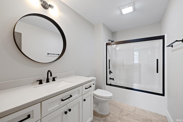 4685 N Triple Crown Dr, Bloomington, IN 47404 - bathroom featuring vanity and bath / shower combo with glass door