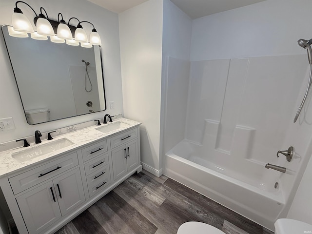 1405 Rosewood Dr, Washington, IN 47501 - full bath with wood finished floors, bathing tub / shower combination, and double vanity