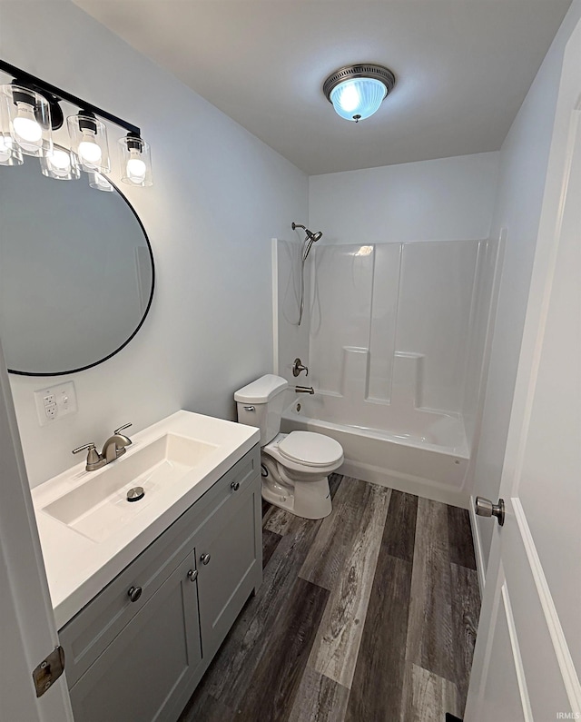 1405 Rosewood Dr, Washington, IN 47501 - bathroom featuring vanity, shower / tub combination, and wood finished floors