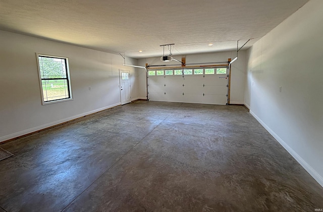 1405 Rosewood Dr, Washington, IN 47501 - garage with a garage door opener and recessed lighting