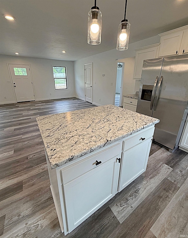 1405 Rosewood Dr, Washington, IN 47501 - kitchen with stainless steel fridge with ice dispenser, dark wood-type flooring, white cabinetry, a center island, and recessed lighting