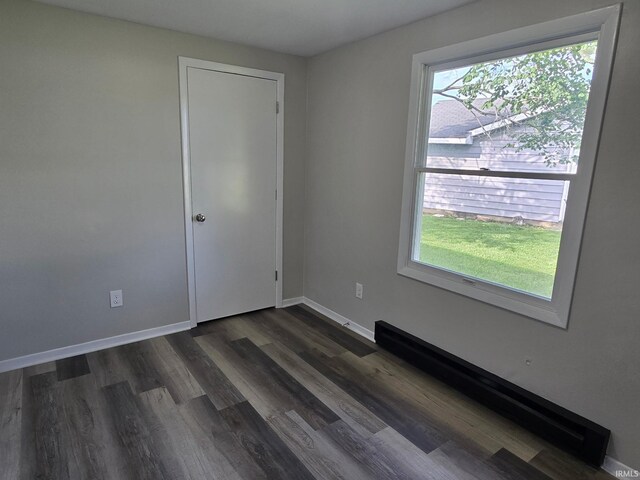 104 Fremont Ln, Decatur, IN 46733 - unfurnished room featuring dark wood-style floors and baseboards