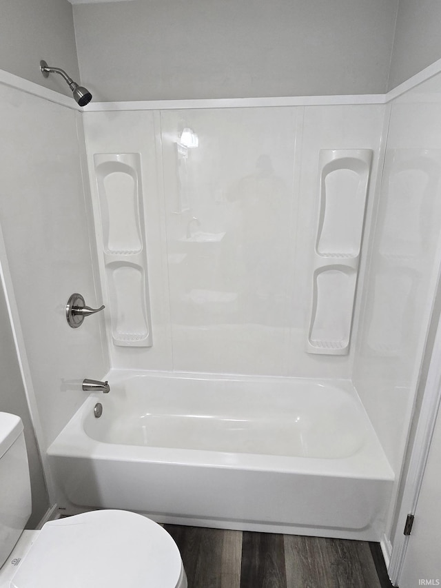 104 Fremont Ln, Decatur, IN 46733 - full bath featuring wood finished floors and shower / bath combination