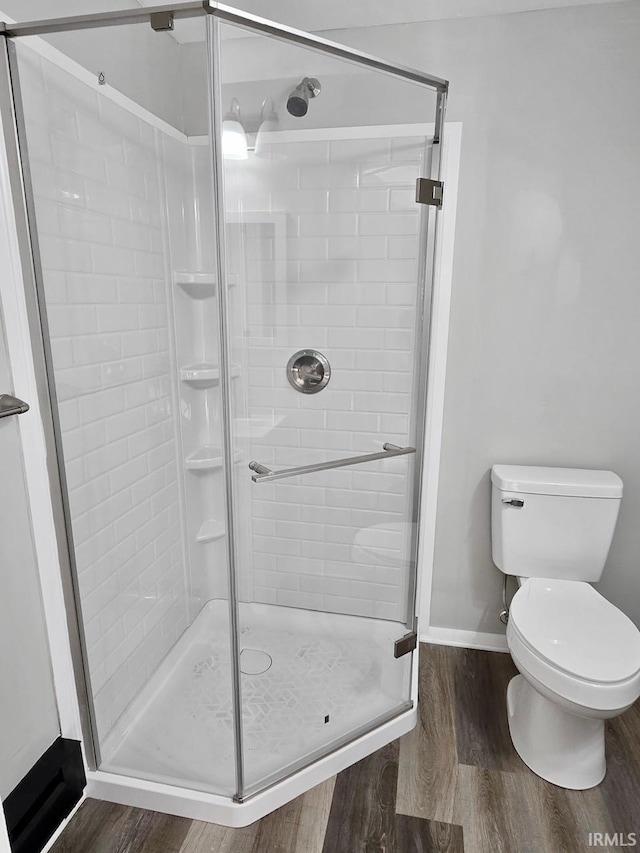 104 Fremont Ln, Decatur, IN 46733 - full bath with wood finished floors and a stall shower