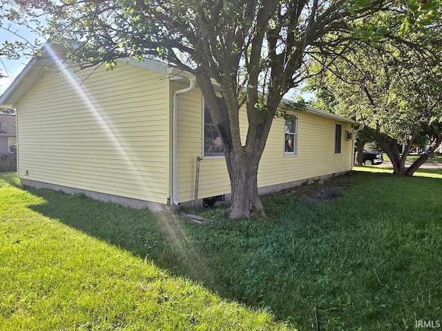 104 Fremont Ln, Decatur, IN 46733 - view of property exterior with a lawn