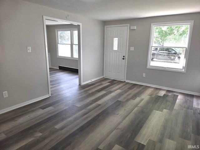 104 Fremont Ln, Decatur, IN 46733 - entrance foyer with baseboards and dark wood-style floors