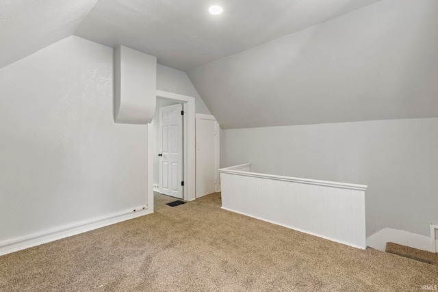 610 N 5th St, Goshen, IN 46528 - additional living space with carpet and lofted ceiling