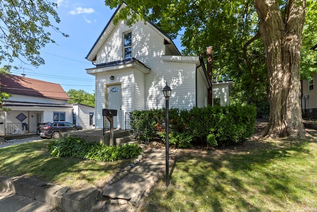 610 N 5th St, Goshen, IN 46528 - view of front of home with a front yard