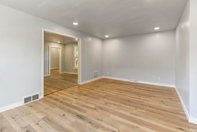 610 N 5th St, Goshen, IN 46528 - spare room featuring wood finished floors and recessed lighting