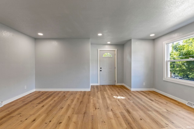 610 N 5th St, Goshen, IN 46528 - foyer with light wood-type flooring and recessed lighting
