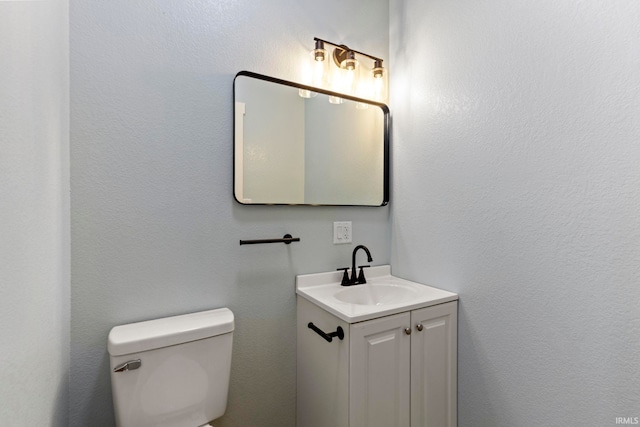 610 N 5th St, Goshen, IN 46528 - half bath featuring vanity and toilet