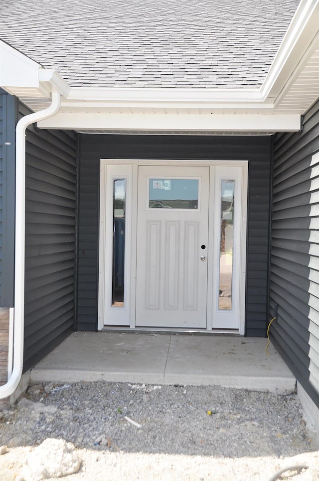 2011 Winesap Way, Kendallville, IN 46755 - doorway to property featuring a shingled roof