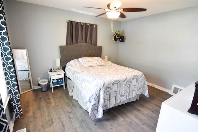 2221 Washington Ave, Evansville, IN 47714 - bedroom featuring wood finished floors and ceiling fan
