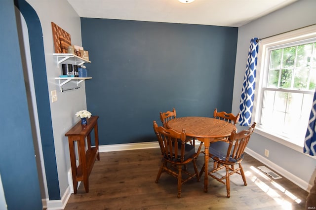 2221 Washington Ave, Evansville, IN 47714 - dining room featuring wood finished floors and arched walkways