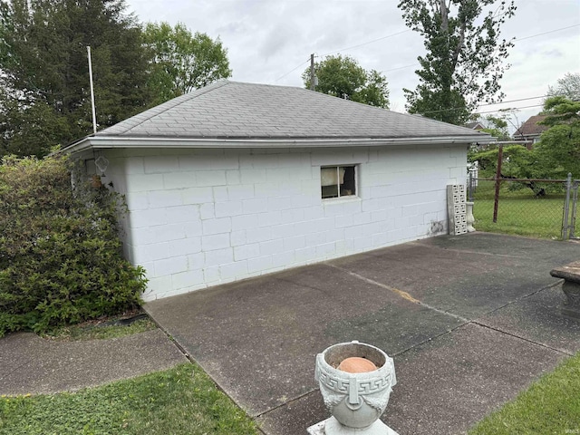 100 S Fairlawn Ave, Evansville, IN 47714 - view of property exterior with concrete block siding and a shingled roof