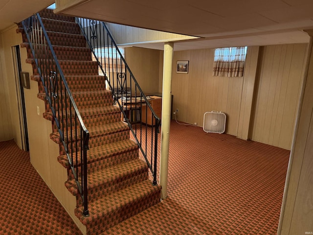 100 S Fairlawn Ave, Evansville, IN 47714 - stairs featuring carpet flooring and wooden walls