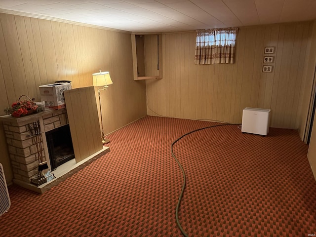 100 S Fairlawn Ave, Evansville, IN 47714 - basement with light carpet, wooden walls, and a fireplace