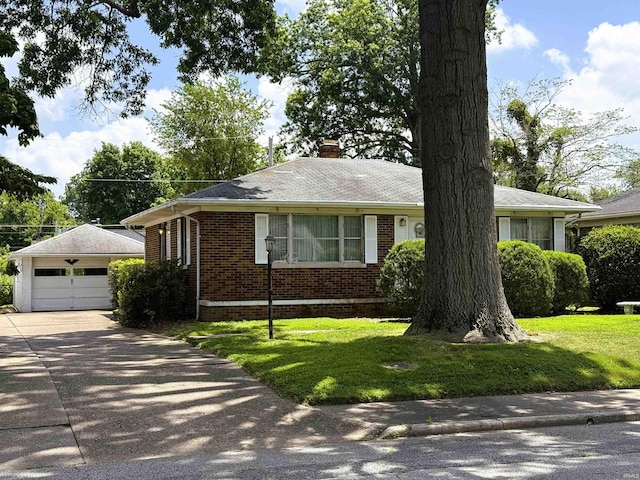 100 S Fairlawn Ave, Evansville, IN 47714 - single story home with an outbuilding, a detached garage, brick siding, a chimney, and a front lawn