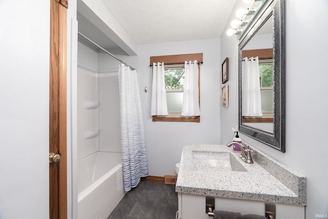 1205 Norma Jean Dr, Lafayette, IN 47909 - full bathroom featuring vanity, shower / bath combo, and a textured ceiling