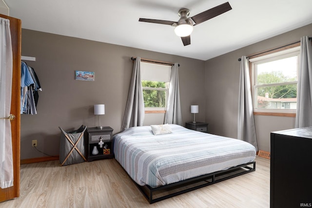 1205 Norma Jean Dr, Lafayette, IN 47909 - bedroom with light wood-style floors and a ceiling fan
