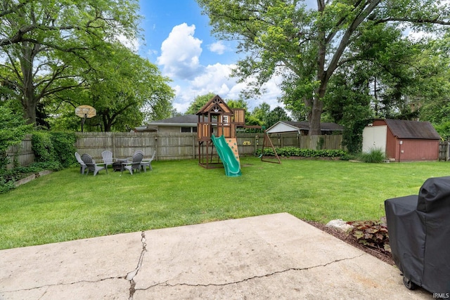 1205 Norma Jean Dr, Lafayette, IN 47909 - fenced backyard featuring a shed, a playground, and a patio area