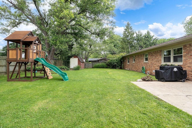1205 Norma Jean Dr, Lafayette, IN 47909 - fenced backyard featuring a playground and a shed