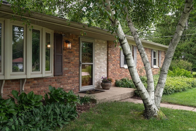 1205 Norma Jean Dr, Lafayette, IN 47909 - view of exterior entry featuring brick siding
