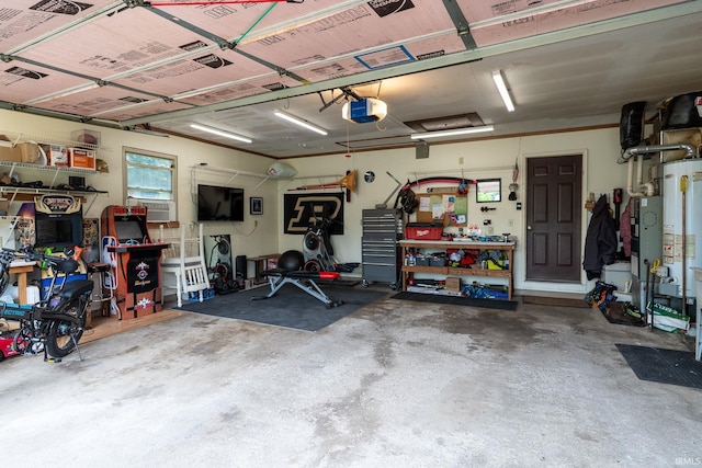 1205 Norma Jean Dr, Lafayette, IN 47909 - garage featuring a garage door opener, a workshop area, and cooling unit