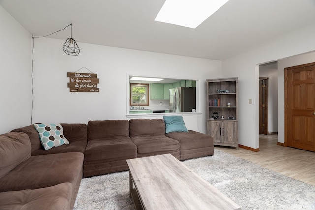 1205 Norma Jean Dr, Lafayette, IN 47909 - living area featuring light wood finished floors and a skylight