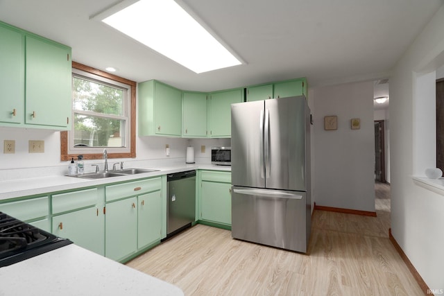 1205 Norma Jean Dr, Lafayette, IN 47909 - kitchen featuring appliances with stainless steel finishes, light countertops, light wood finished floors, and green cabinets