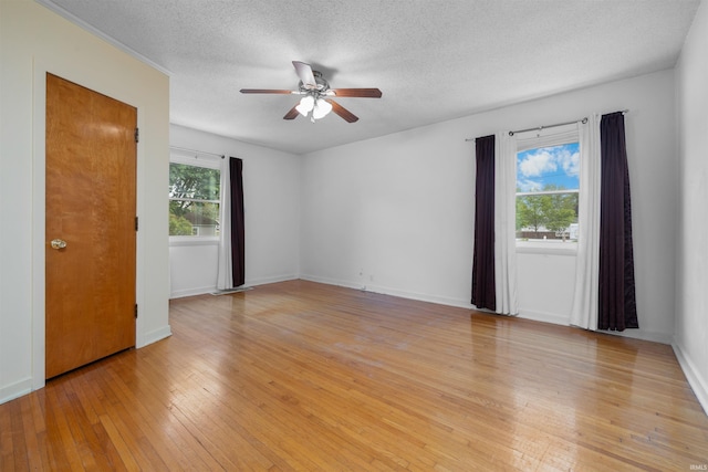501 N Van Buren St, Auburn, IN 46706 - spare room featuring a ceiling fan, a textured ceiling, and light wood finished floors