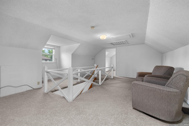 501 N Van Buren St, Auburn, IN 46706 - bonus room with a textured ceiling, carpet, and lofted ceiling