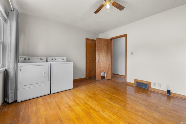 501 N Van Buren St, Auburn, IN 46706 - laundry room featuring washing machine and clothes dryer, ceiling fan, and light wood-type flooring