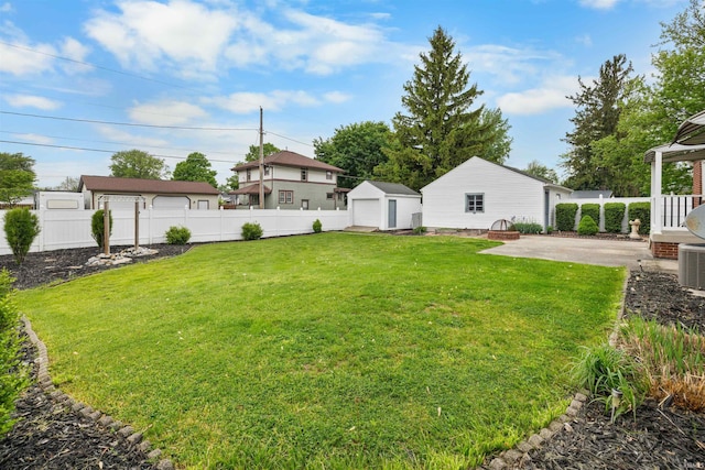 501 N Van Buren St, Auburn, IN 46706 - fenced backyard featuring a patio area and an outdoor structure